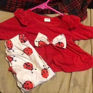 Red and white ladybug outfit